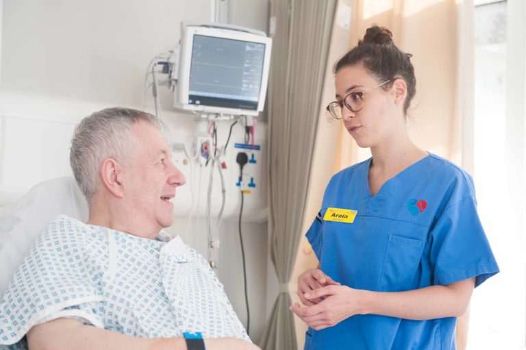 Nurse and patient talking